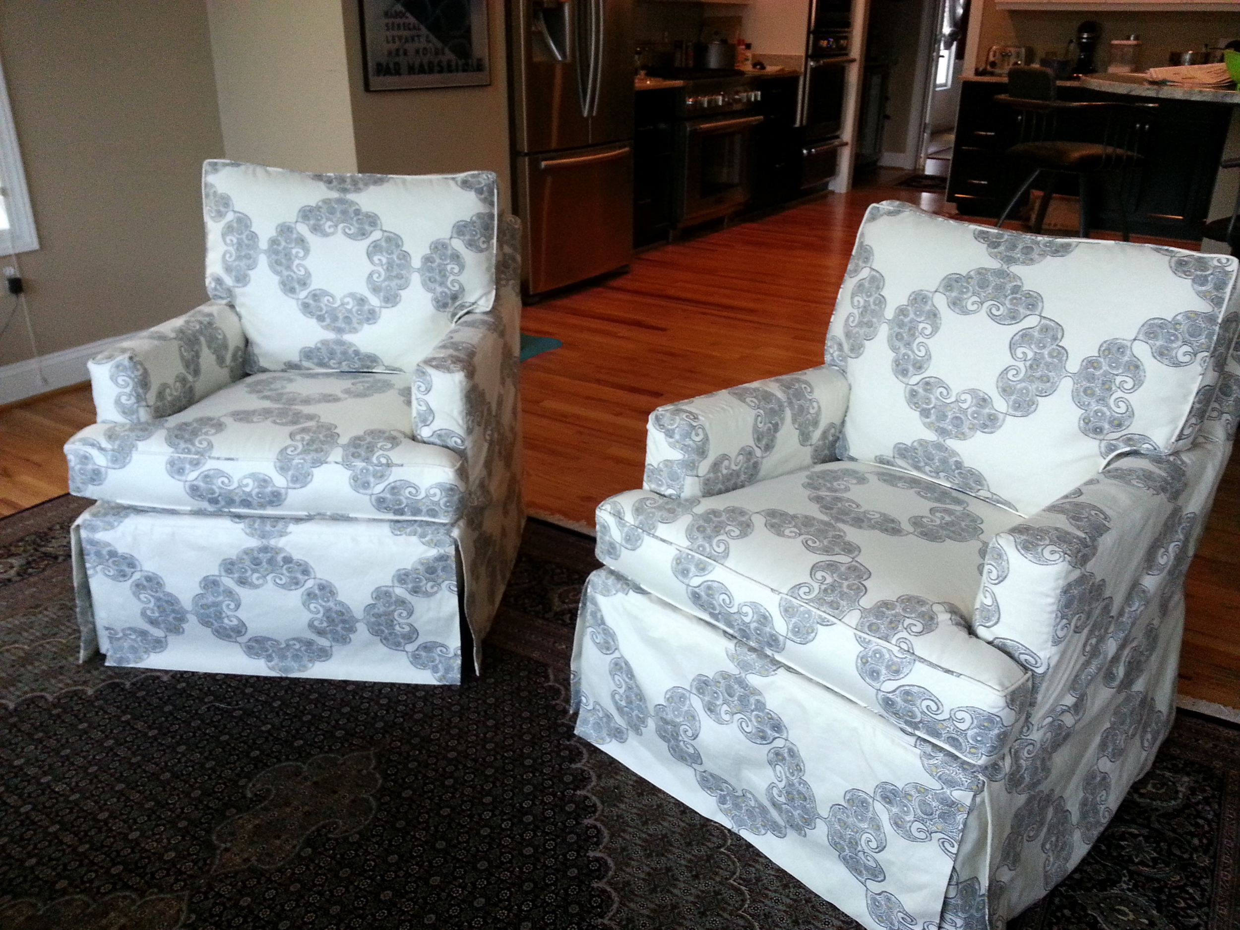 Slipcovers made in John Robshaw fabric.