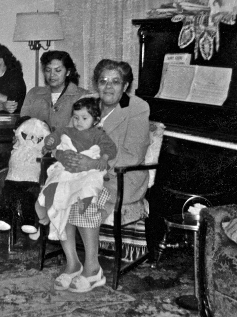 T.V. at 180 east Second street (detail) ^ neighbor holding panda.........Jessie Escamilla holding Elaine Bedoya Robert L. Bedoya: "Our next door neighbor, Jessie Escamilla raised her only child, David, as his father died