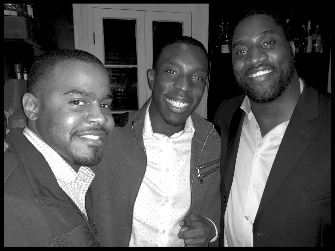 Nth alum, Dr. Donovan Johnson (Orthopaedic Resident at Tulane University) greets Nth Scholars, Wendell Cole and Jamal Fitts.
