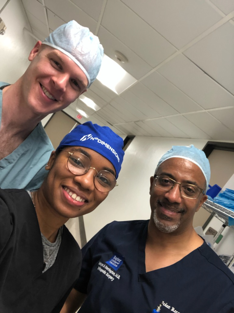 Dr. Melvyn Harrington, right, with Ebony Jernigan.
