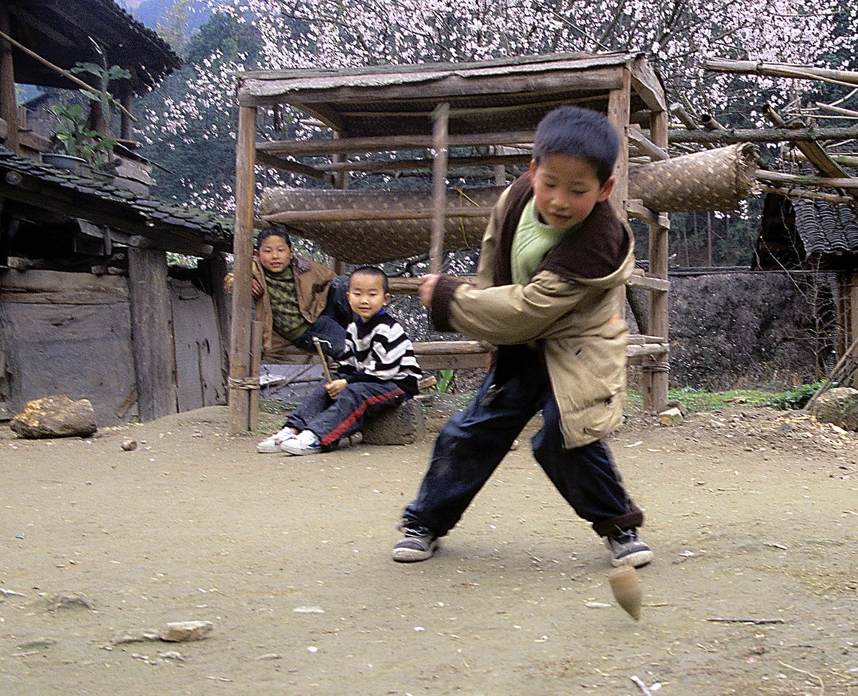 Spinning the top, Bameng, China