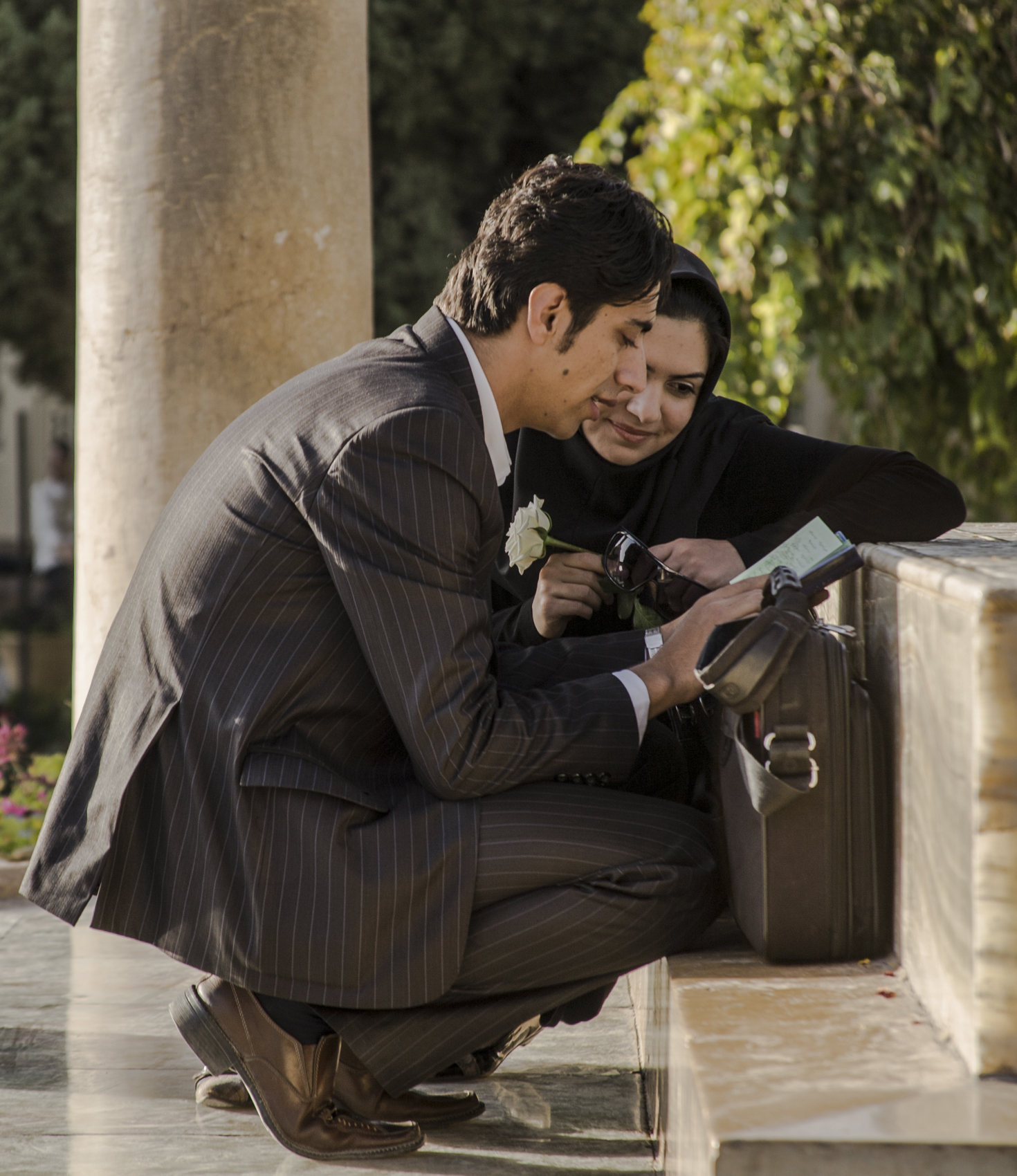 Reading at the tomb of Hafiz, Shiraz