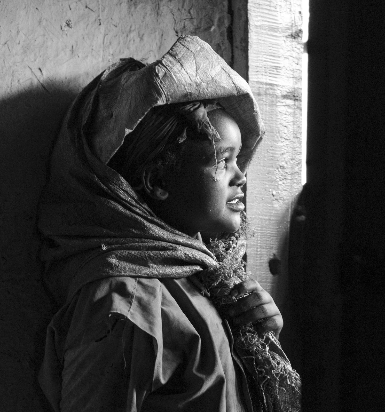 Dorze girl, waiting for rain to stop