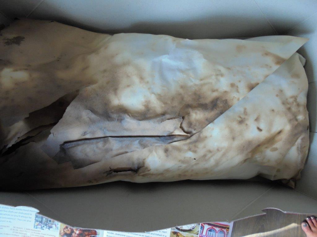 Salted chicken wrapped in paper