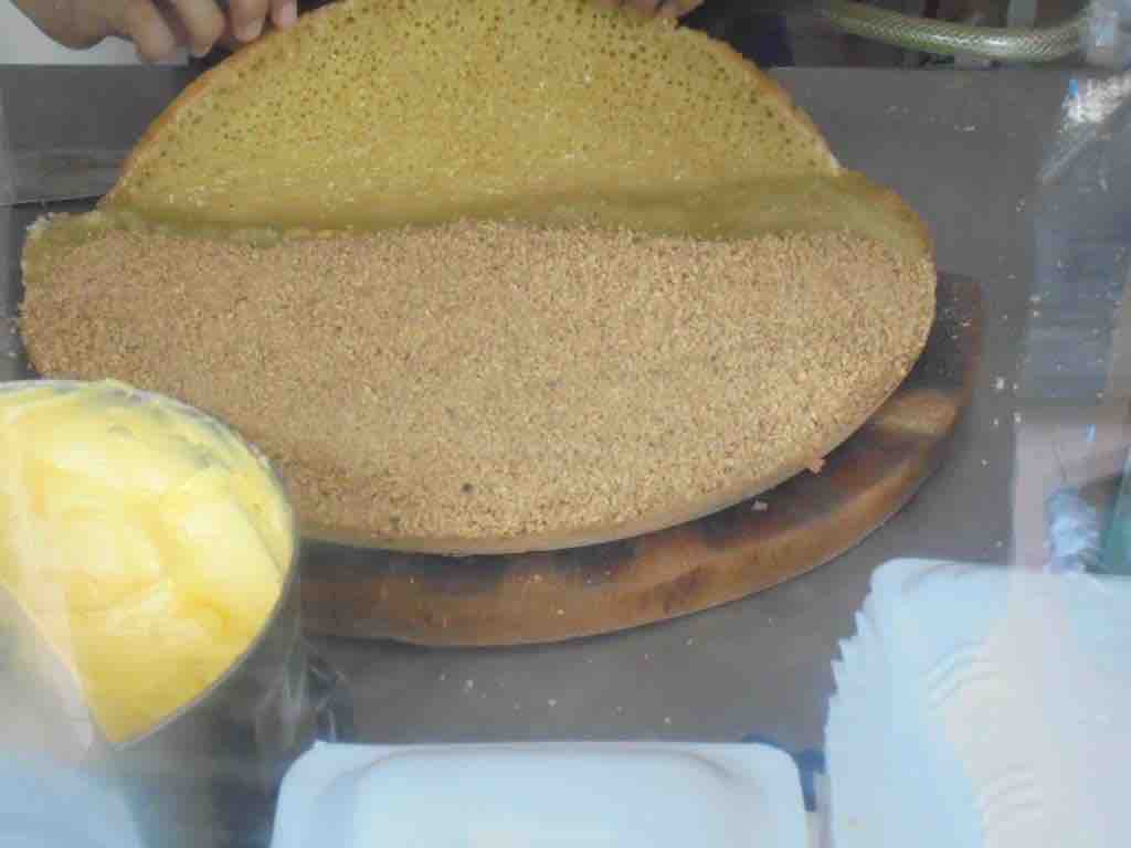 Covered with crushed peanuts