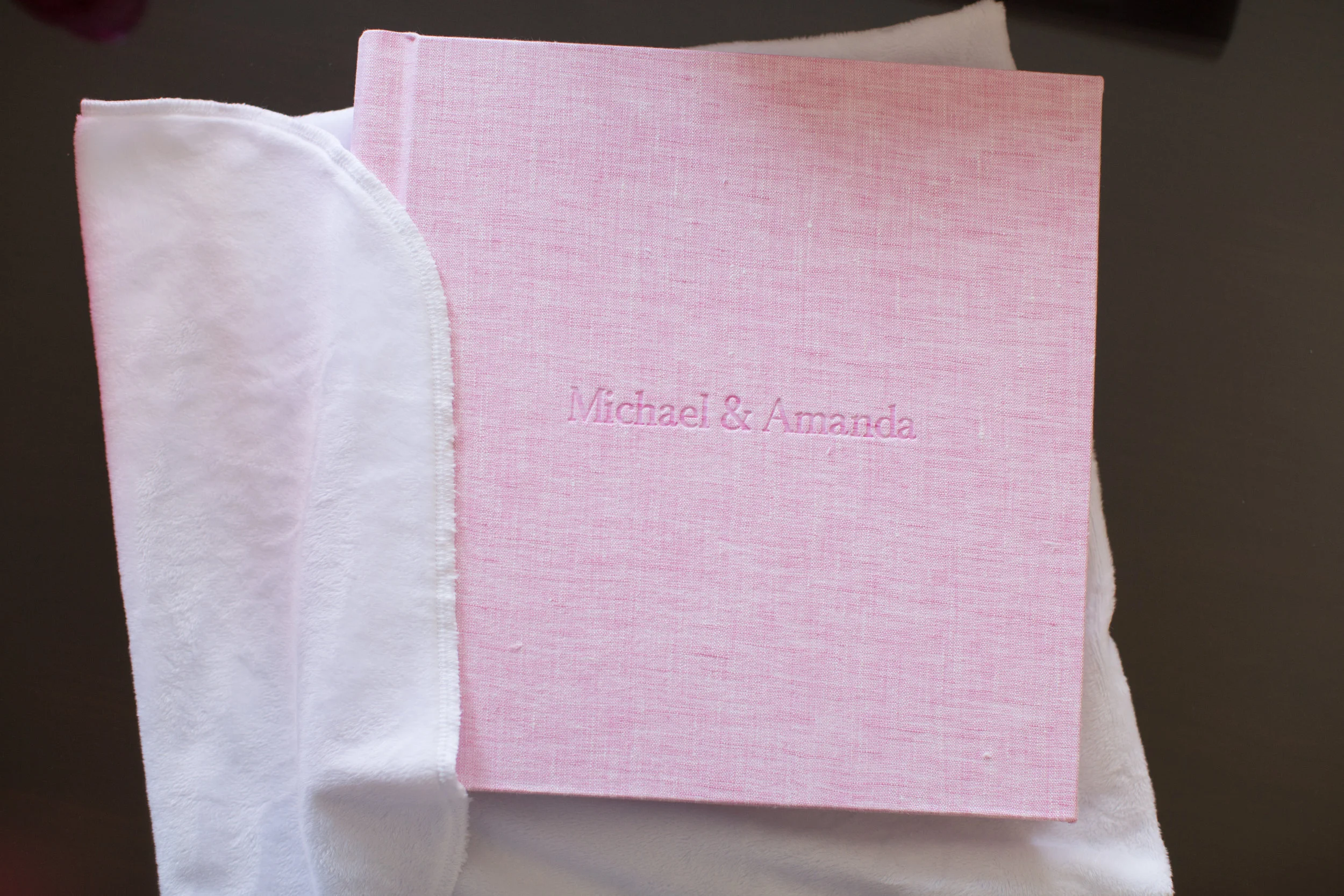 One of my absolute favorite details about this album is that it is personalized with the bride and groom's name- and I love the font! The album comes in a really soft wrap to protect it- I only wish my pillow was as soft.