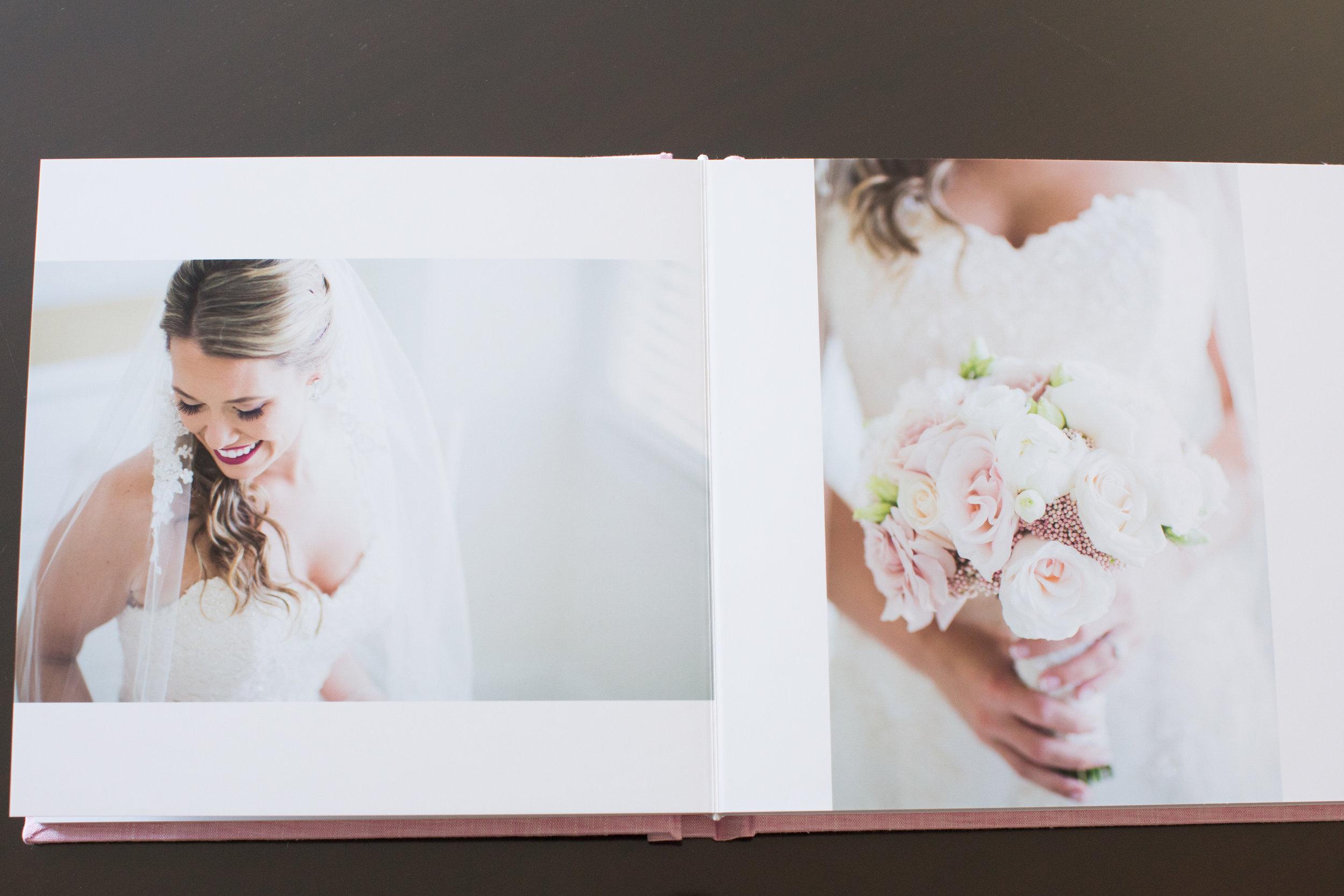 I love how the image of Amanda's bouquet bleeds to the top and bottom of the page. When it comes to photos in an album- the bigger the better!