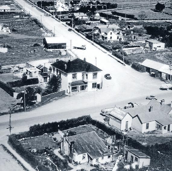 Aerial view: Prebbleton circa 1950, showing the hotel corner and Station Road (now Tosswill) stretching into the distance.