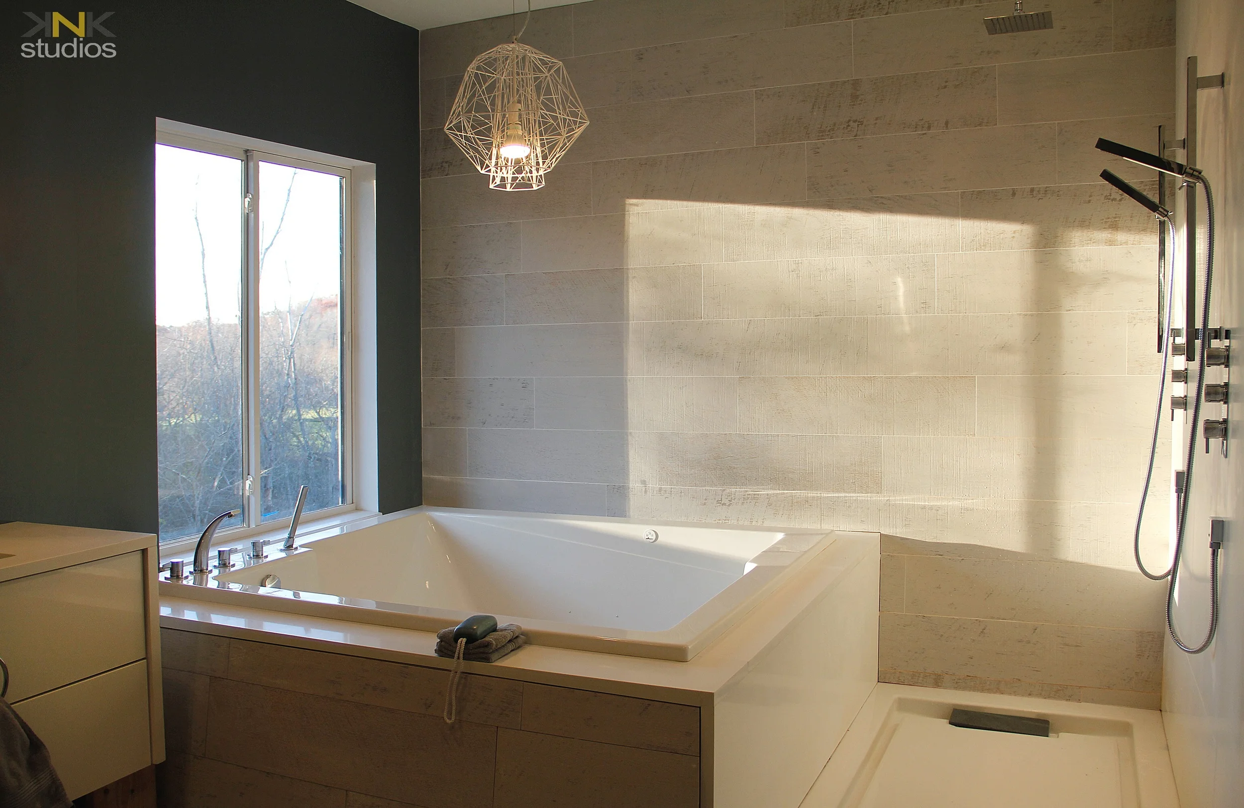 Two people tub, and showers.