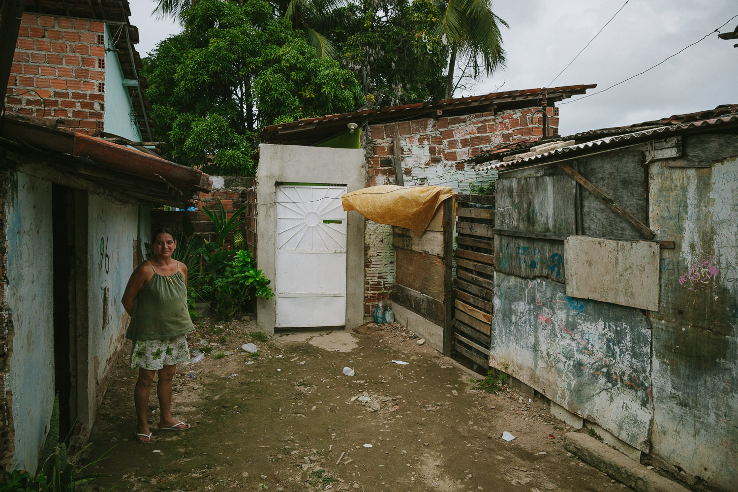   The neighborhood where Emidio lives is a very very poor section of the city with substantial poverty and high crime rate. Many of the houses are nothing more than pieces of thin wood and tin. In spite of this, many friendly people live there and ar