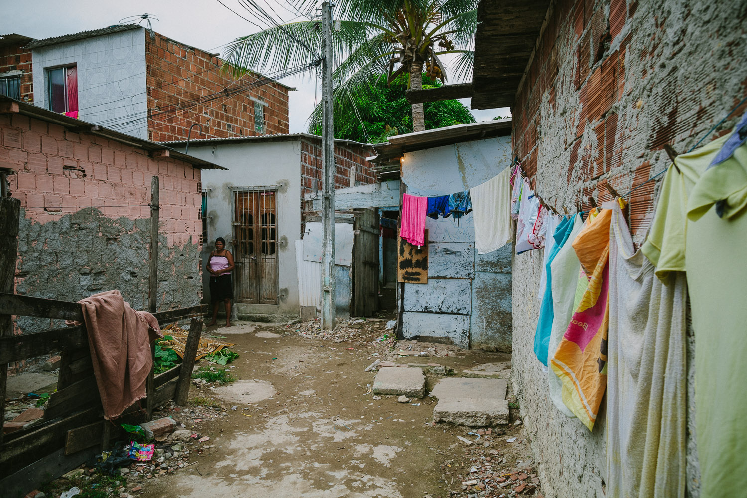   The neighborhood where Emidio lives is a very very poor section of the city with substantial poverty and high crime rate. Many of the houses are nothing more than pieces of thin wood and tin. In spite of this, many friendly people live there and ar