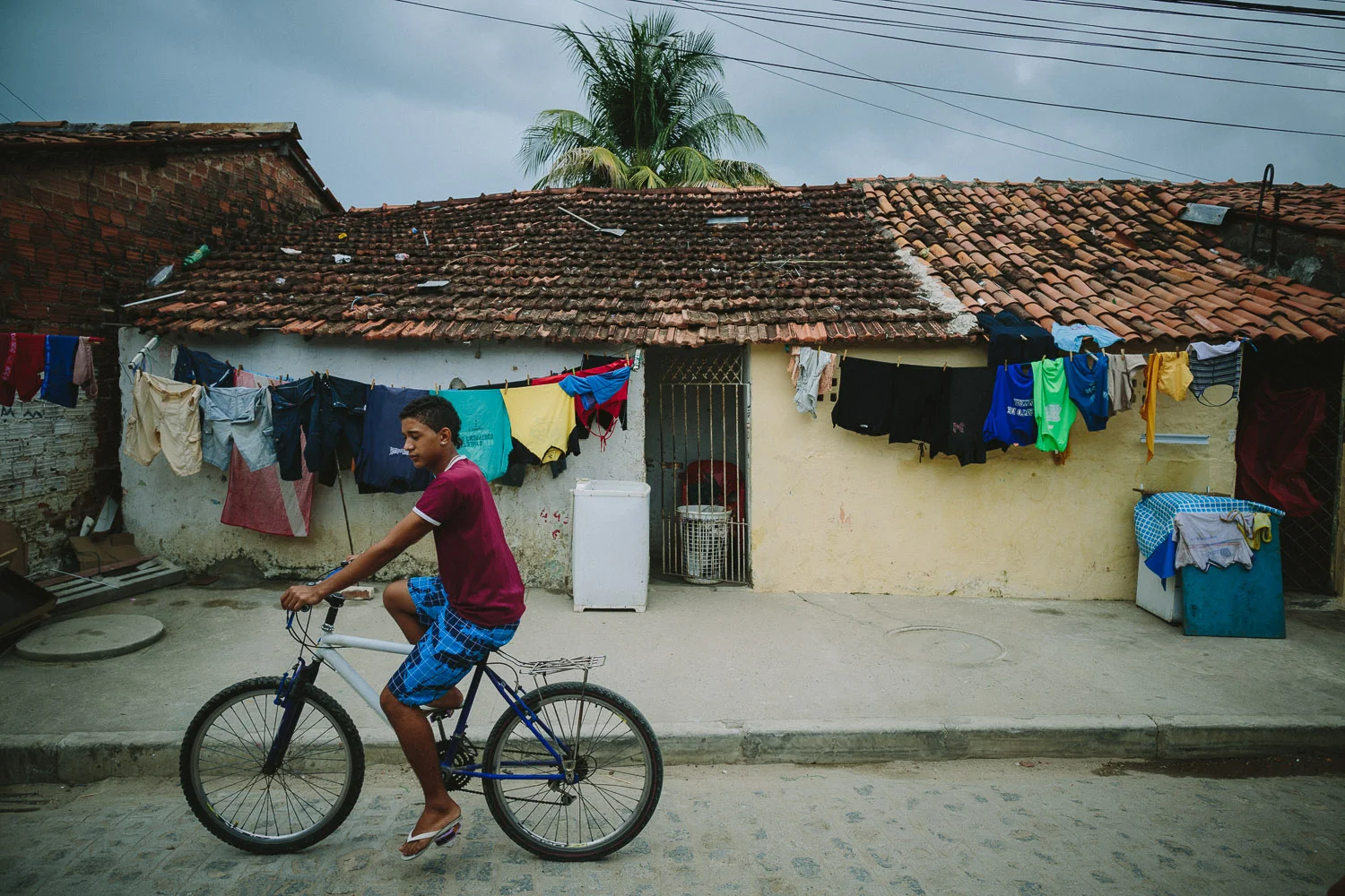 The neighborhood where Emidio lives is a very very poor section of the city with substantial poverty and high crime rate. Many of the houses are nothing more than pieces of thin wood and tin. In spite of this, many friendly people live there and are often generous with their smiles and kindness.