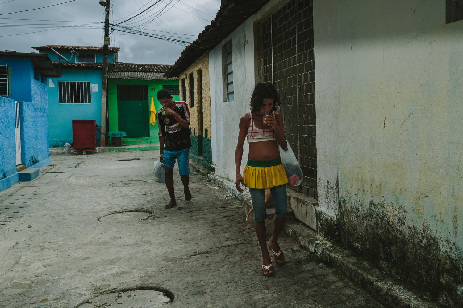   Sadly, people walking the streets strung out on drugs is a common sight in Emidio's neighborhood. The neighborhood where Emidio lives is a very very poor section of the city with substantial poverty and high crime rate. Many of the houses are nothi