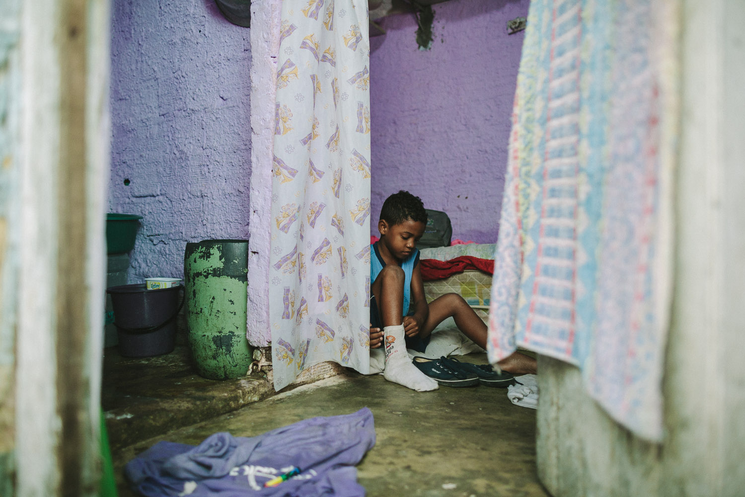  Emidio's entire house (housing 4 people---soon to be 5) is perhaps no larger than 8 feet by 10 feet. This is Emidio's morning routine before heading to classes at the Compassion Center.  