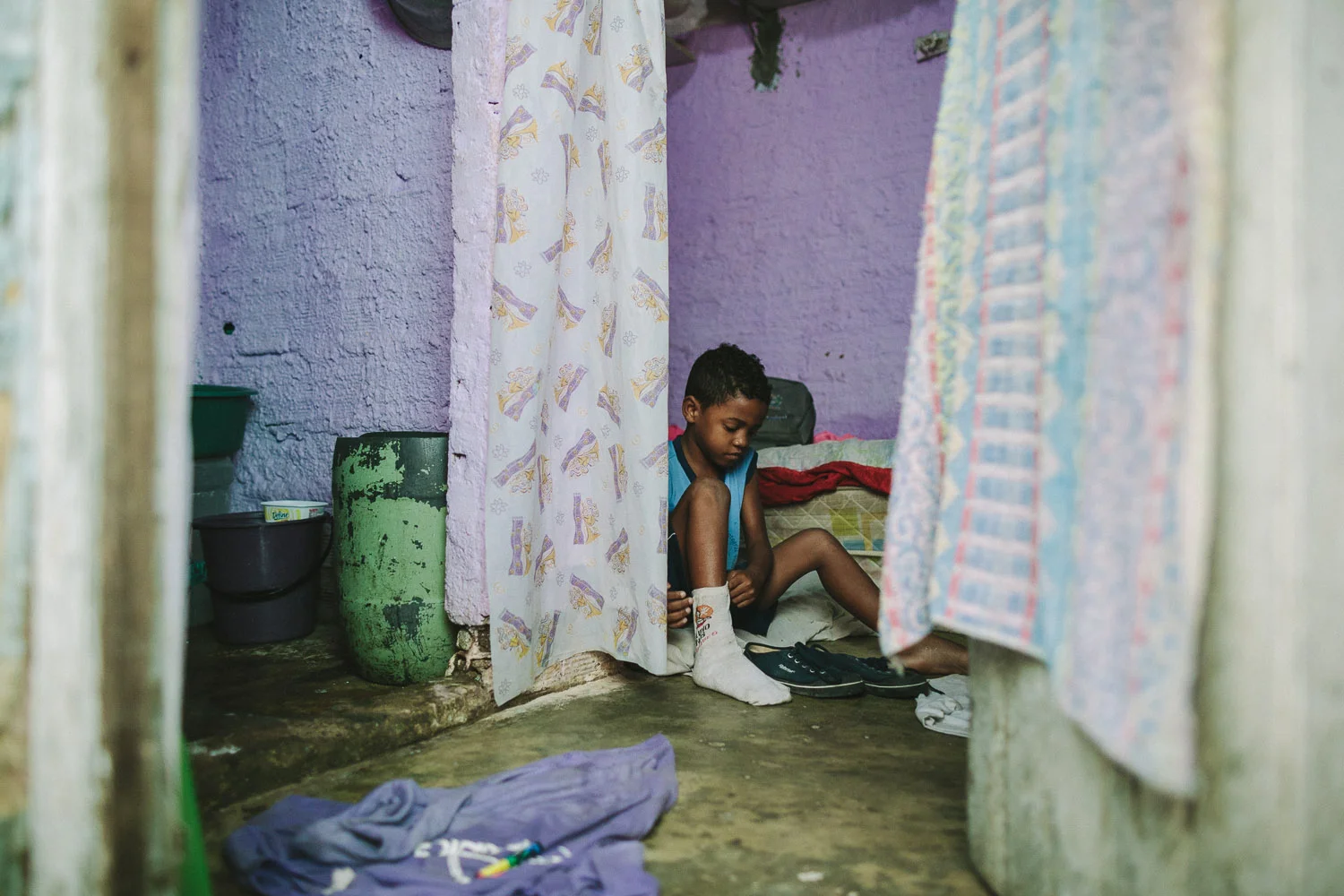 Emidio's entire house (housing 4 people---soon to be 5) is perhaps no larger than 8 feet by 10 feet. This is Emidio's morning routine before heading to classes at the Compassion Center.