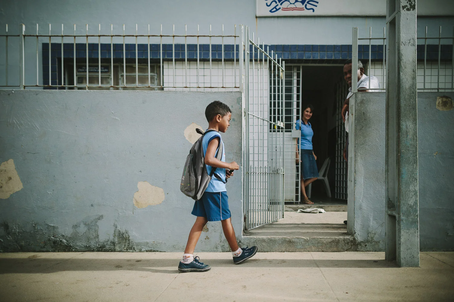 Emidio walking to his classes at the Compassion Center.