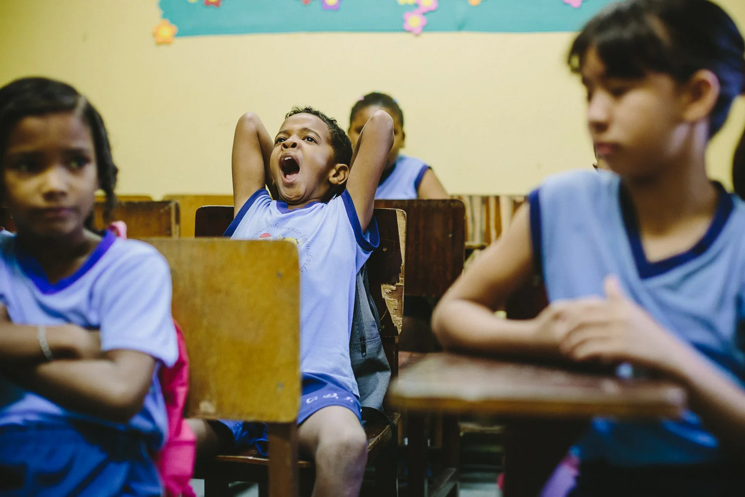 Like kids all around the world, being in class can often be a tiring endervor as evidenced by frequent yawning during morning classes. Emidio during classes at the Compassion Center.