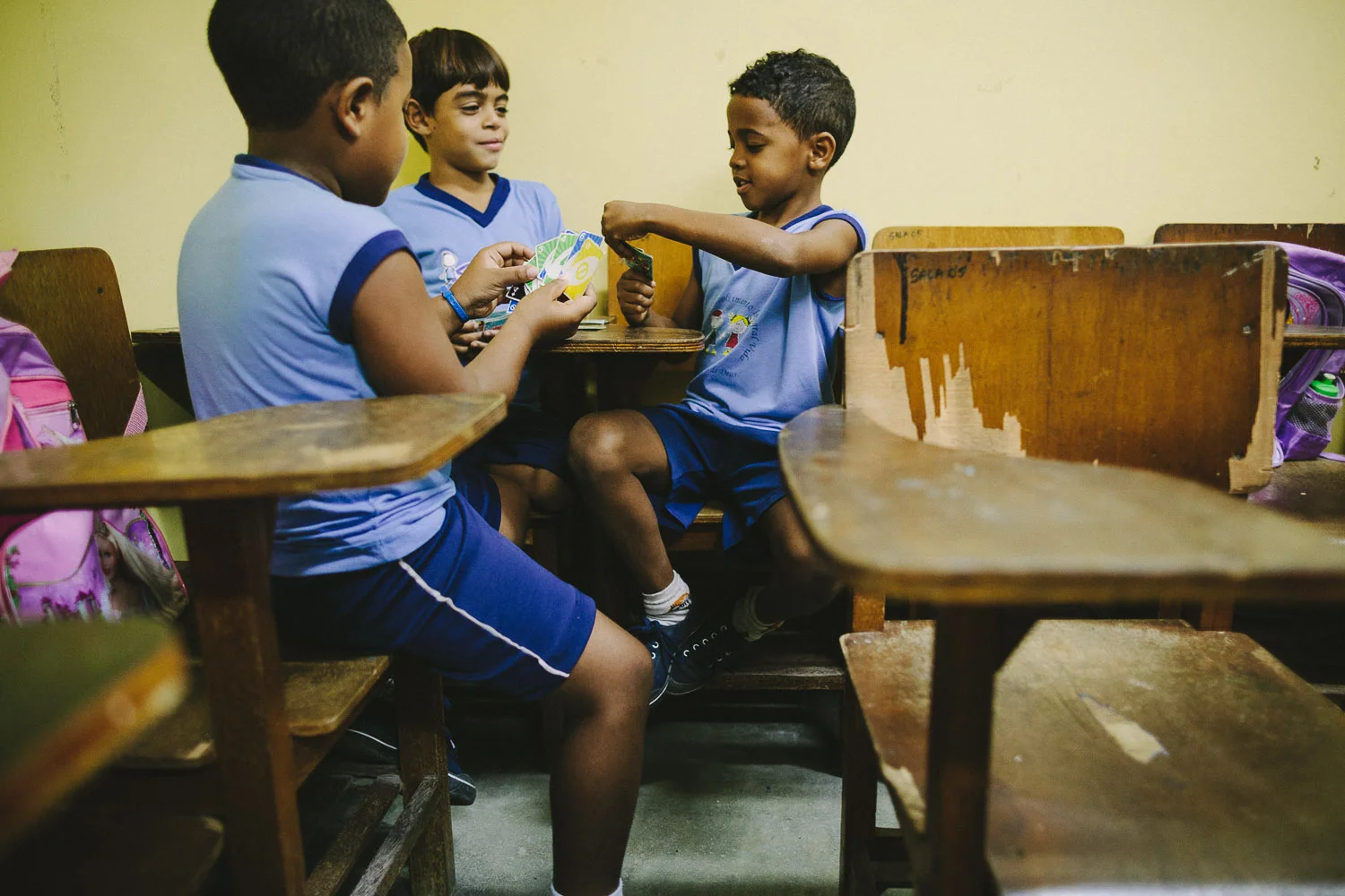 During free classroom time, Emidio enjoys playing Uno with his friends. Emidio during classes at the Compassion Center.