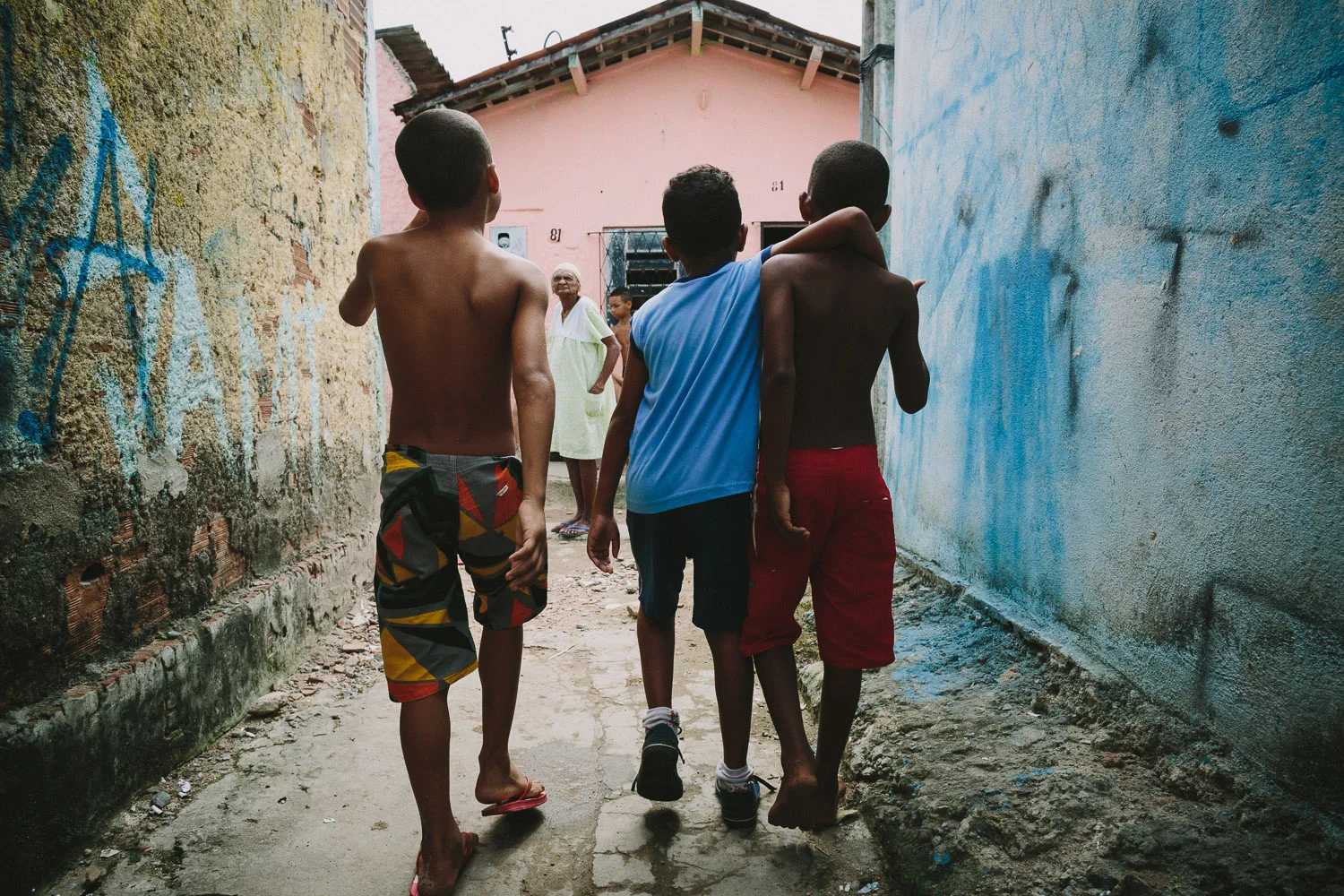 Emidio is join by a friend on his walk back from the Compassion Center. After his time at the Compassion Center, Emidio walks to his "aunt's" house (family friend---no relation) to be taken care of before heading to school since his mother works until 10pm each night.