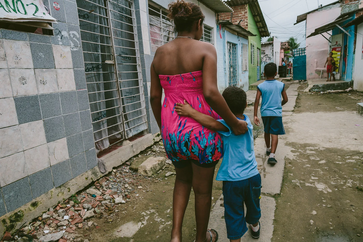 Before heading to his mother's friends house, Emidio's mother joins him for a bit before heading to her job. After his time at the Compassion Center, Emidio walks to his "aunt's" house (family friend---no relation) to be taken care of before heading to school since his mother works until 10pm each night.