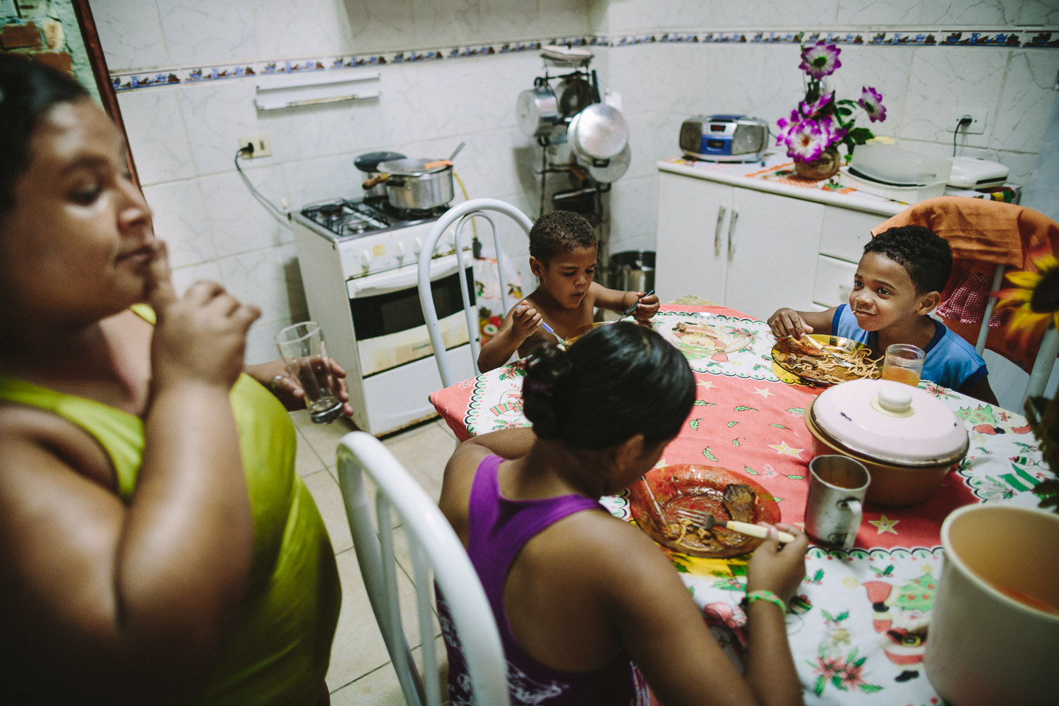   Emidio is a very talkative boy and full of life. Sometimes he needs to be reminded to speak softer during meals (as in this photo). Each day an "aunt" (family friend--relation) takes care of Emidio and his younger brother between his time at the Co