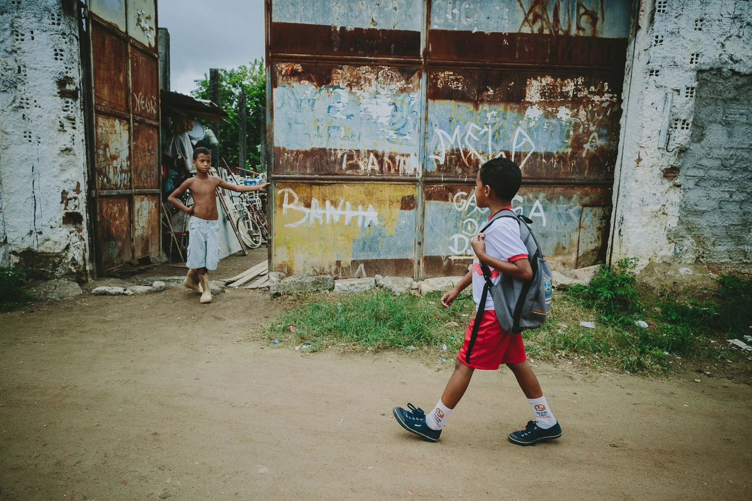 After eating lunch and taking his shower and getting ready at his "aunt's" house (family friend---no relation), Emidio walks to his school.