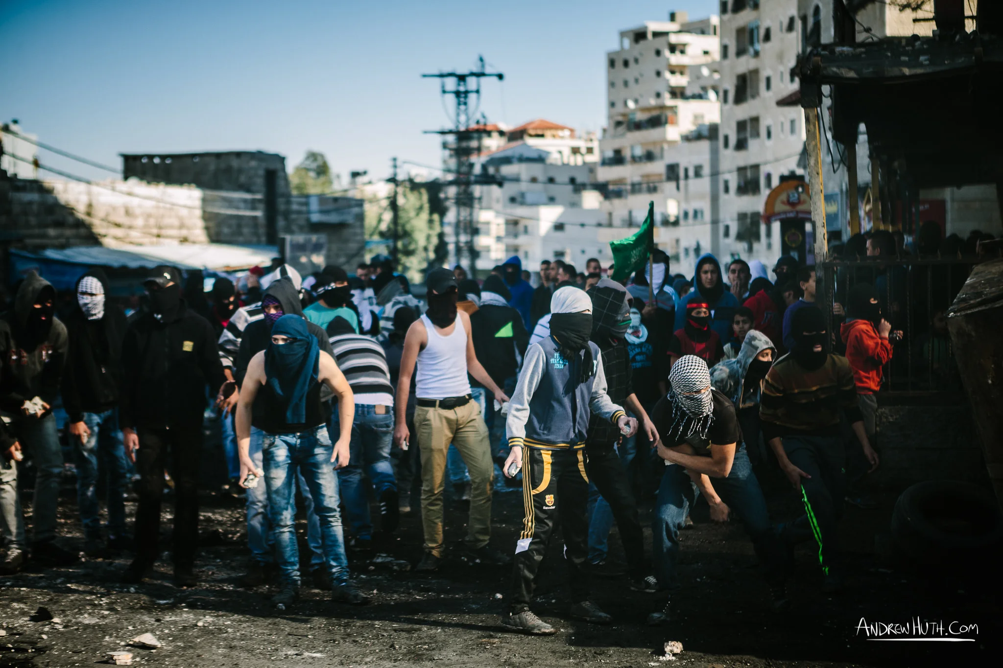 Palestinian youth clash with Israeli military in Shu'afat Refugee Camp in East Jerusalem on Friday, November 7, 2014. The recent, but temporarily total closure of one of Muslim's holiest sites, the Al-Aqsa Mosque, (the first since 1967) and the subsequent limited access for many Muslims to the mosque since has raised tension between Israeli's military and the Arab community.