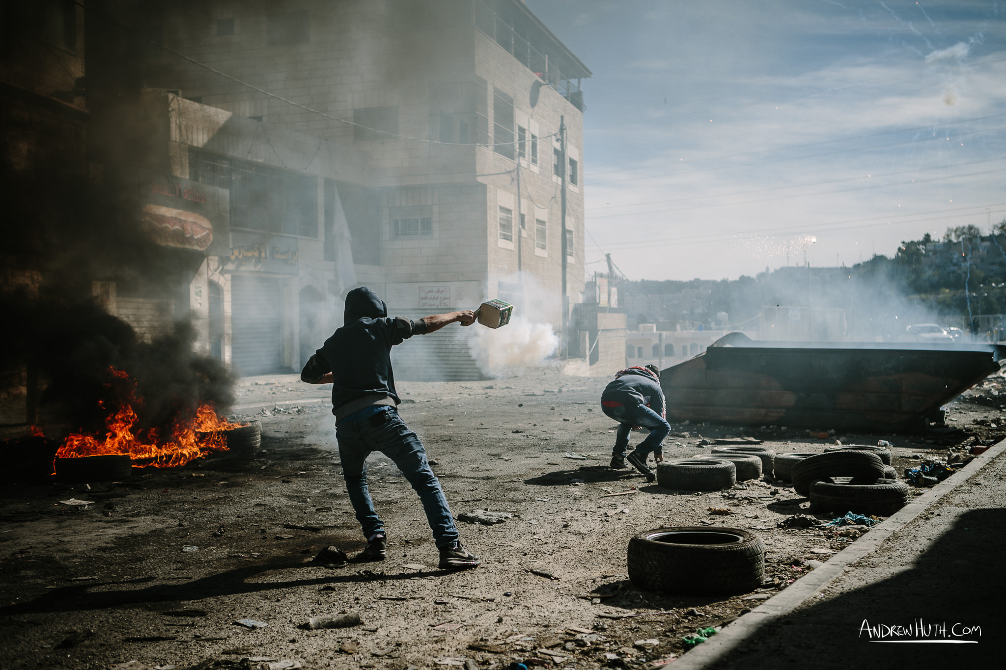 Palestinian youth clash with Israeli military in Shu'afat Refugee Camp in East Jerusalem on Friday, November 7, 2014. The recent, but temporarily total closure of one of Muslim's holiest sites, the Al-Aqsa Mosque, (the first since 1967) and the subsequent limited access for many Muslims to the mosque since has raised tension between Israeli's military and the Arab community.