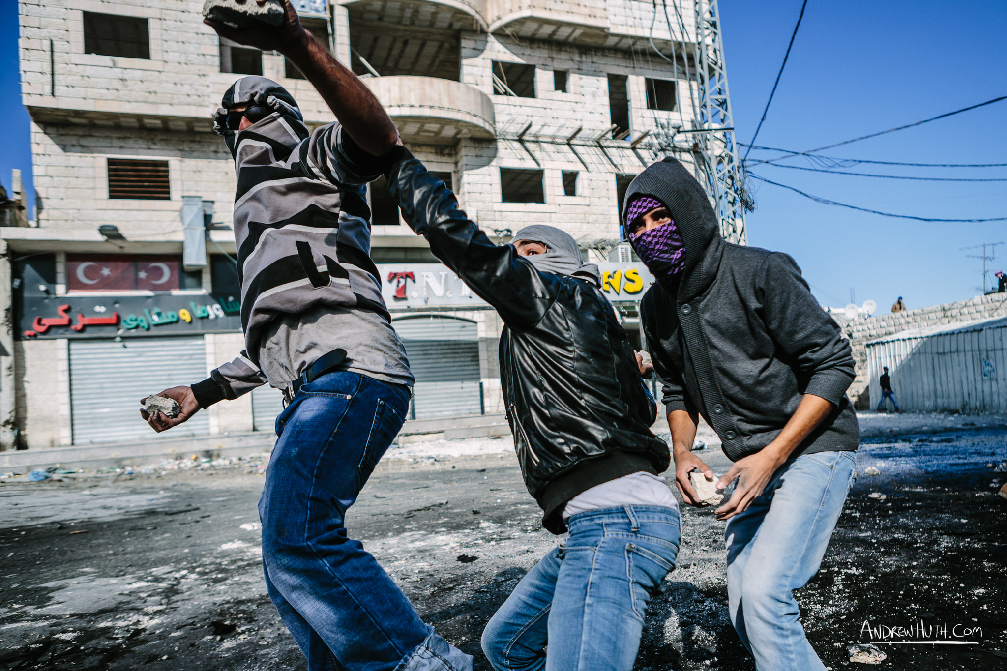 Palestinian youth clash with Israeli military in Shu'afat Refugee Camp in East Jerusalem on Friday, November 7, 2014. The recent, but temporarily total closure of one of Muslim's holiest sites, the Al-Aqsa Mosque, (the first since 1967) and the subsequent limited access for many Muslims to the mosque since has raised tension between Israeli's military and the Arab community.