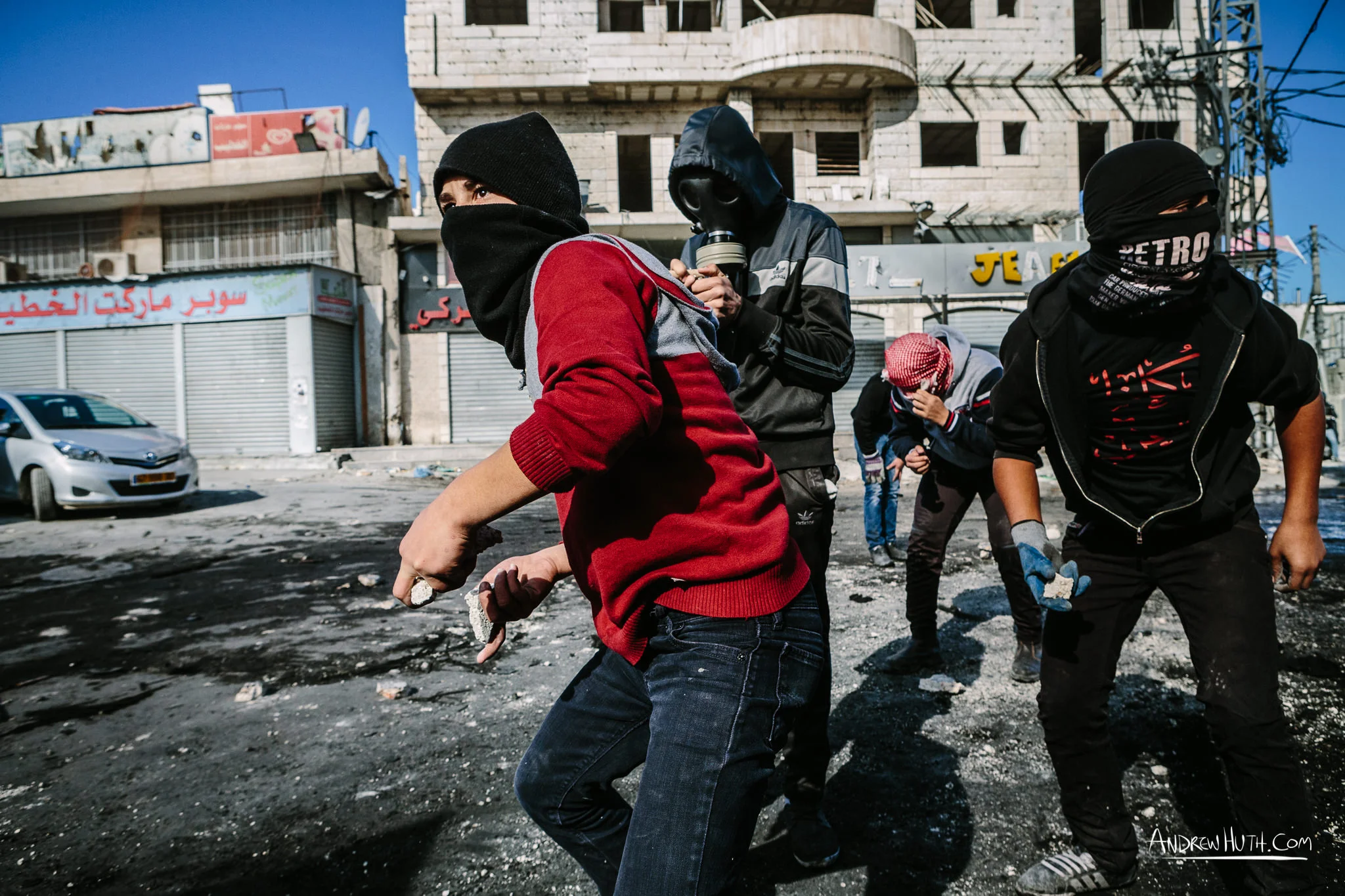 Palestinian youth clash with Israeli military in Shu'afat Refugee Camp in East Jerusalem on Friday, November 7, 2014. The recent, but temporarily total closure of one of Muslim's holiest sites, the Al-Aqsa Mosque, (the first since 1967) and the subsequent limited access for many Muslims to the mosque since has raised tension between Israeli's military and the Arab community.
