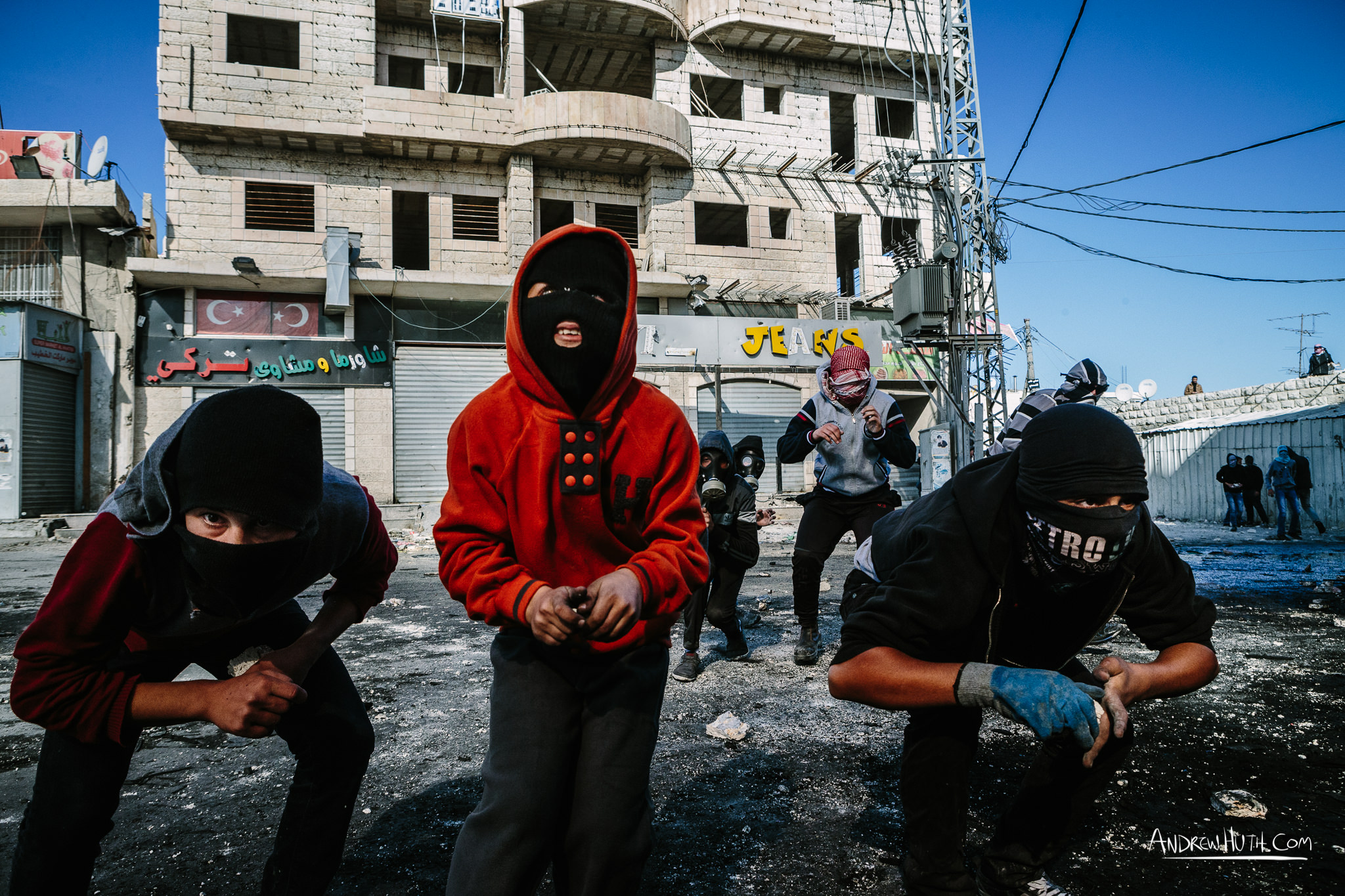 Palestinian youth clash with Israeli military in Shu'afat Refugee Camp in East Jerusalem on Friday, November 7, 2014. The recent, but temporarily total closure of one of Muslim's holiest sites, the Al-Aqsa Mosque, (the first since 1967) and the subsequent limited access for many Muslims to the mosque since has raised tension between Israeli's military and the Arab community.