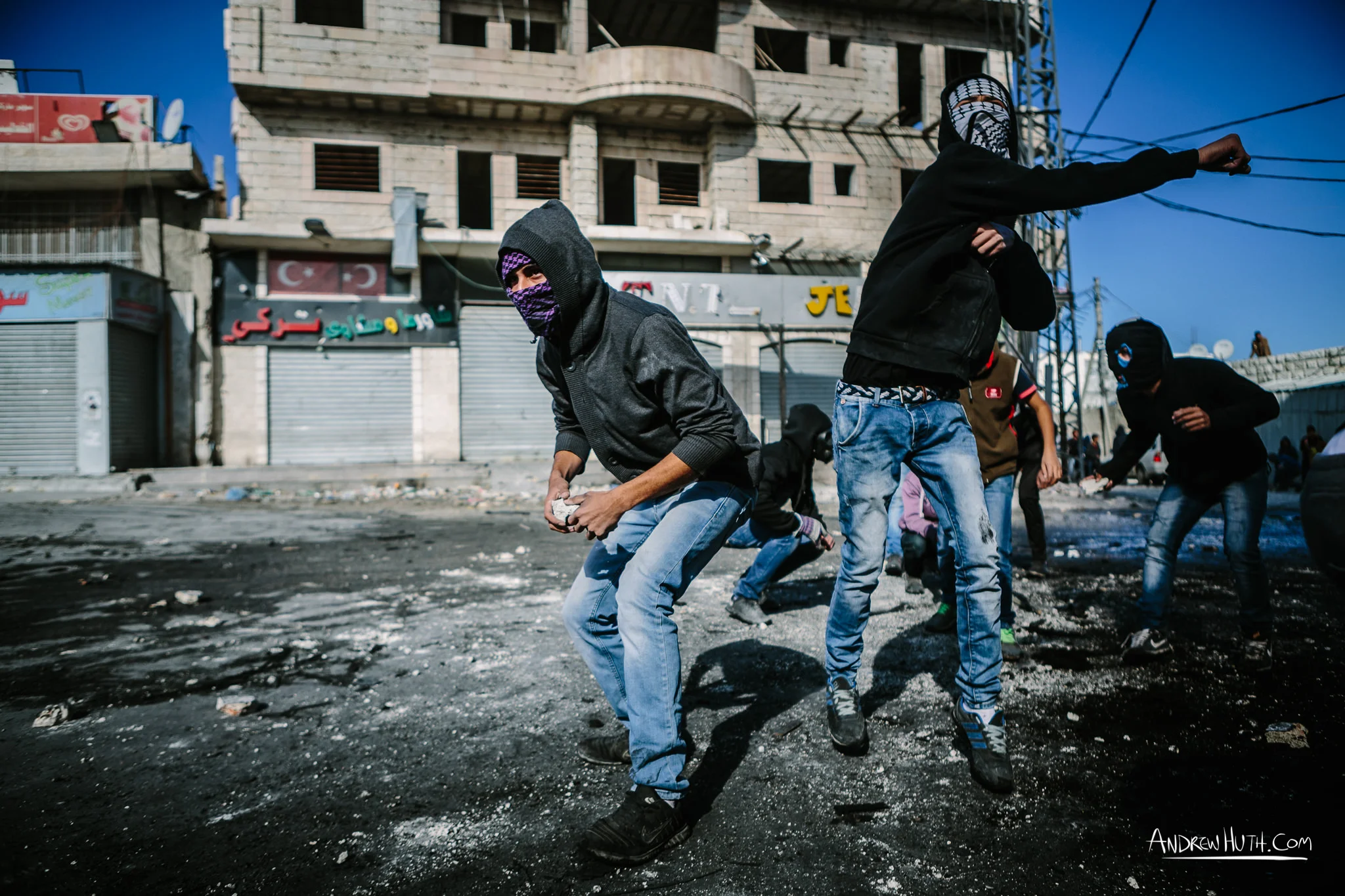Palestinian youth clash with Israeli military in Shu'afat Refugee Camp in East Jerusalem on Friday, November 7, 2014. The recent, but temporarily total closure of one of Muslim's holiest sites, the Al-Aqsa Mosque, (the first since 1967) and the subsequent limited access for many Muslims to the mosque since has raised tension between Israeli's military and the Arab community.