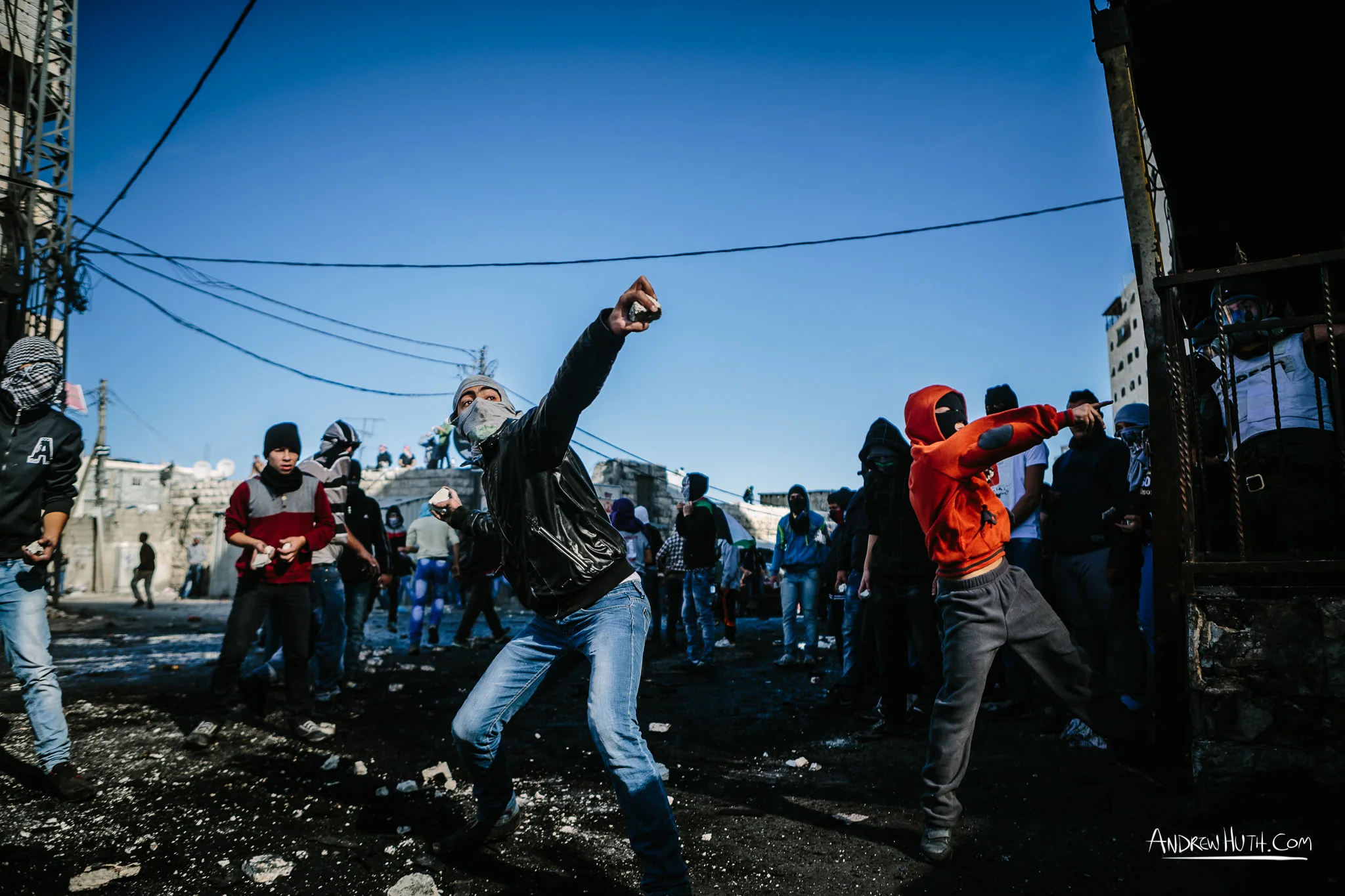 Palestinian youth clash with Israeli military in Shu'afat Refugee Camp in East Jerusalem on Friday, November 7, 2014. The recent, but temporarily total closure of one of Muslim's holiest sites, the Al-Aqsa Mosque, (the first since 1967) and the subsequent limited access for many Muslims to the mosque since has raised tension between Israeli's military and the Arab community.