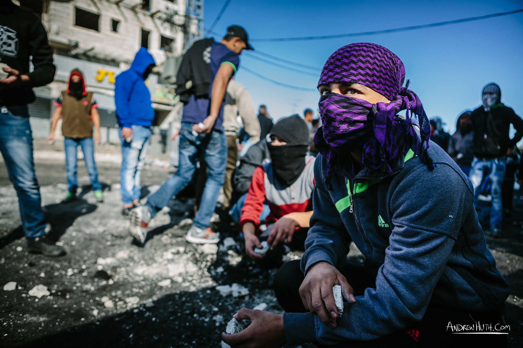 Palestinian youth clash with Israeli military in Shu'afat Refugee Camp in East Jerusalem on Friday, November 7, 2014. The recent, but temporarily total closure of one of Muslim's holiest sites, the Al-Aqsa Mosque, (the first since 1967) and the subsequent limited access for many Muslims to the mosque since has raised tension between Israeli's military and the Arab community.