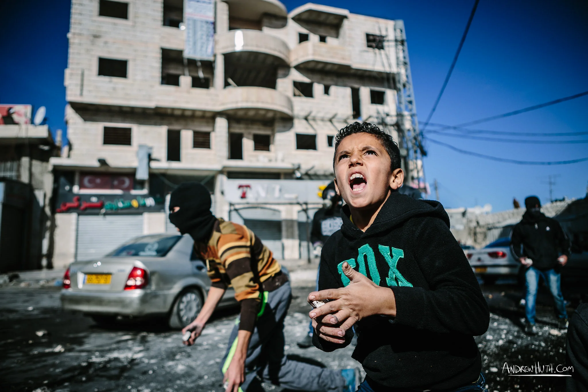 Palestinian youth clash with Israeli military in Shu'afat Refugee Camp in East Jerusalem on Friday, November 7, 2014. The recent, but temporarily total closure of one of Muslim's holiest sites, the Al-Aqsa Mosque, (the first since 1967) and the subsequent limited access for many Muslims to the mosque since has raised tension between Israeli's military and the Arab community.