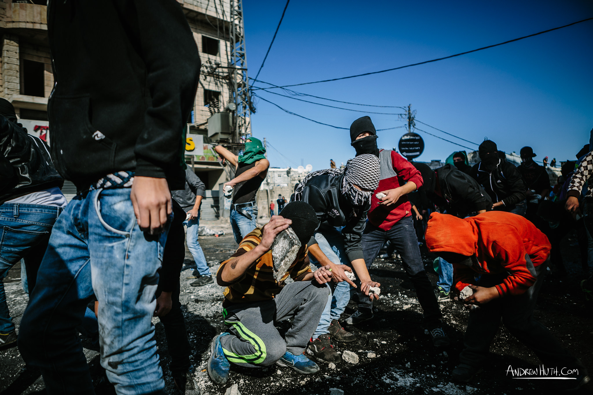 Palestinian youth clash with Israeli military in Shu'afat Refugee Camp in East Jerusalem on Friday, November 7, 2014. The recent, but temporarily total closure of one of Muslim's holiest sites, the Al-Aqsa Mosque, (the first since 1967) and the subsequent limited access for many Muslims to the mosque since has raised tension between Israeli's military and the Arab community.