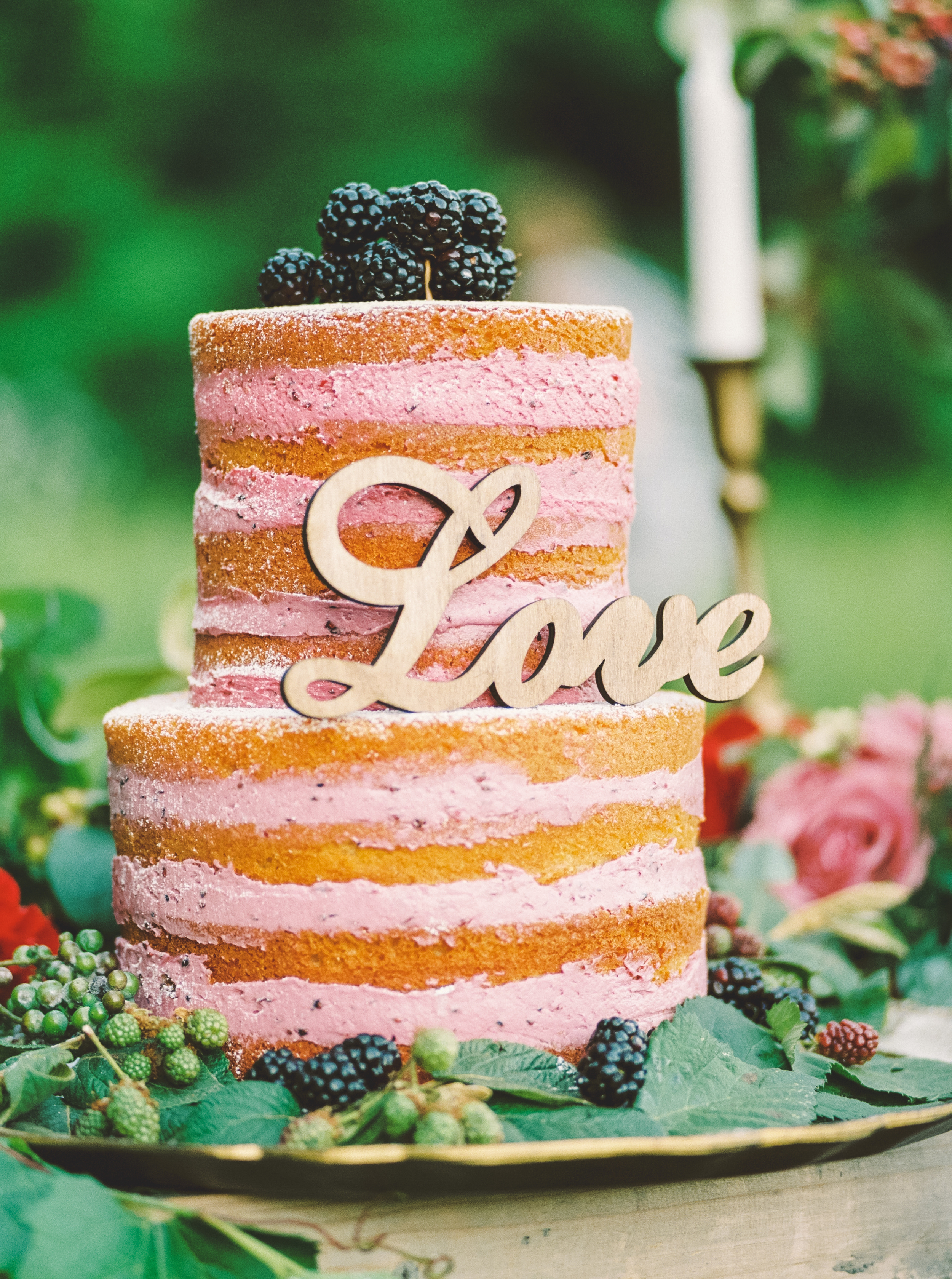 bare wedding cake with fruit