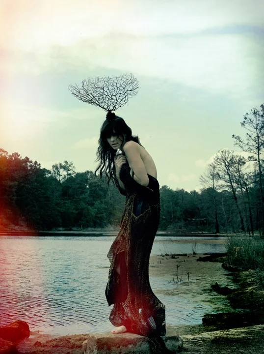 Kelley Ash in Phoenix Rising. Styling by Rachel Hunt of Sisters of the Black Moon. Make up by Jacqueline Fernandez. Hair by Lati Domi. Jewelry by Leslie Crow. With Prism Of Threads silk blouse by Tracy McCarty.  Assistance by Alicin Ciscernos. Full …