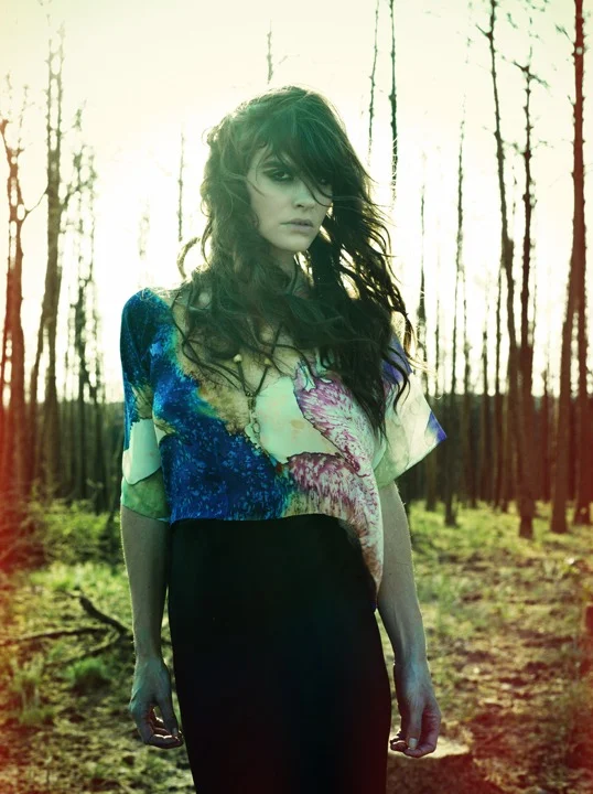 Kelley Ash in Phoenix Rising. Styling by Rachel Hunt of Sisters of the Black Moon. Make up by Jacqueline Fernandez. Hair by Lati Domi. Jewelry by Leslie Crow. With Prism Of Threads silk blouse by Tracy McCarty.  Assistance by Alicin Ciscernos. Full …