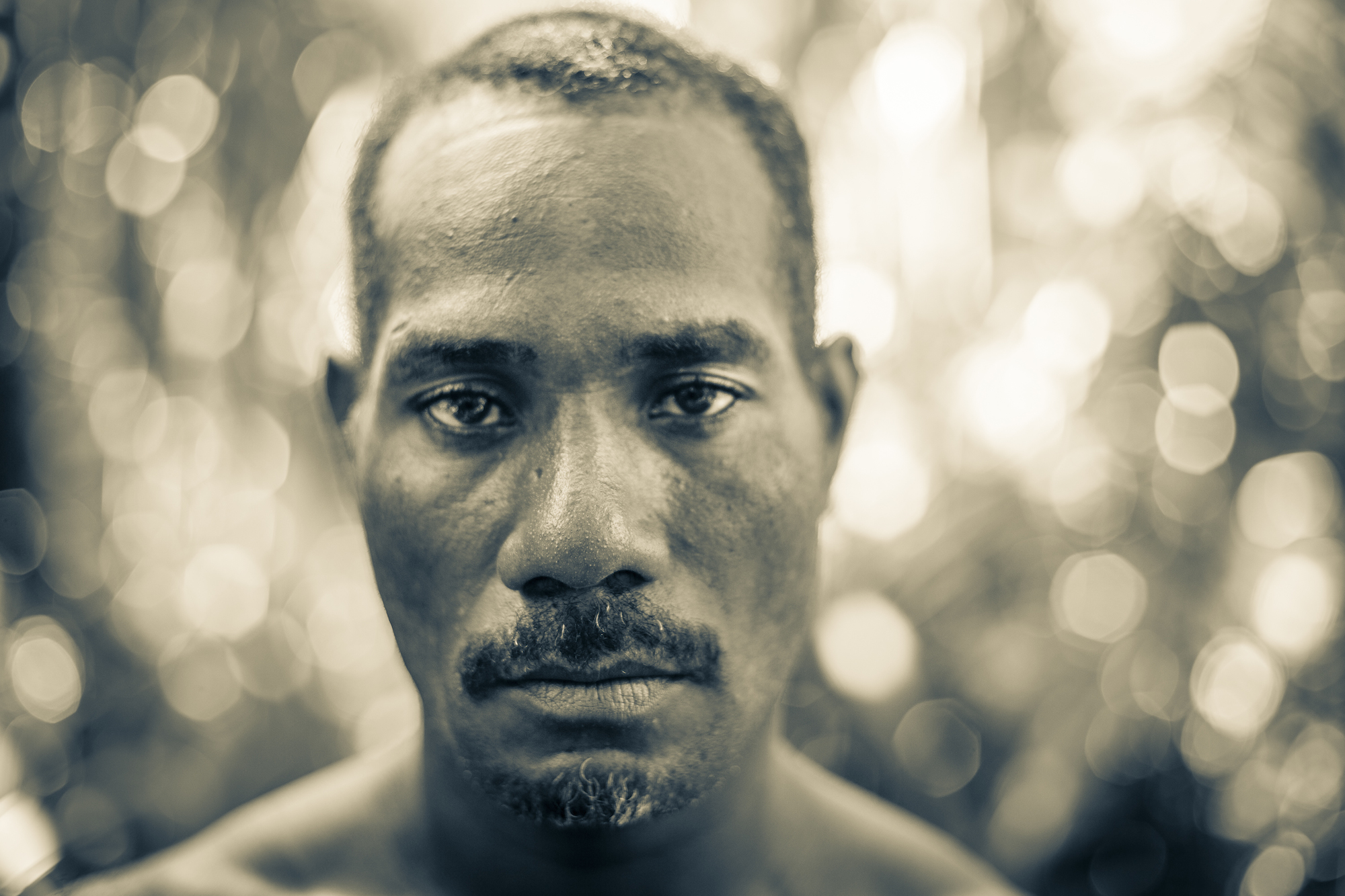 A portrait of Lonsdale, a Solomon Islander from the Makira Province and one of Dr. Uy's right-hand men. — in Solomon Islands.