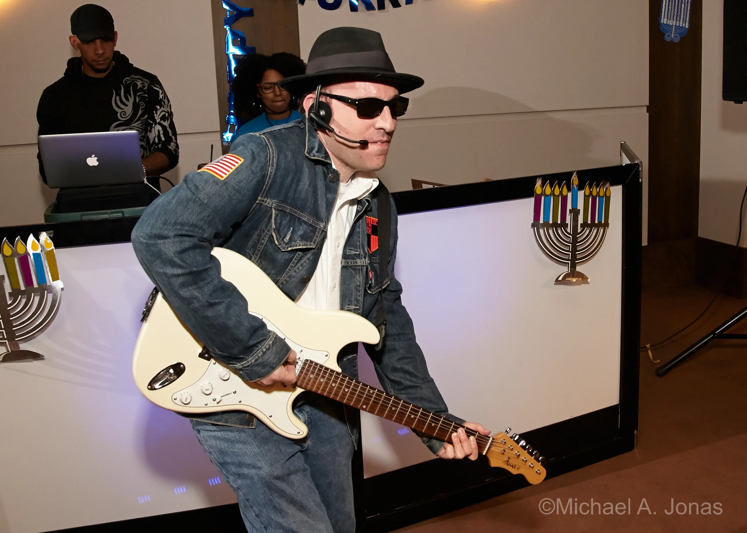 Adam rocking out at JARC's annual ILS Hanukkah Party
