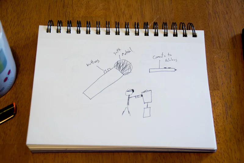 An early concept of the pen, including a reference to how the tip would have to be able to touch the artifacts without damaging them.