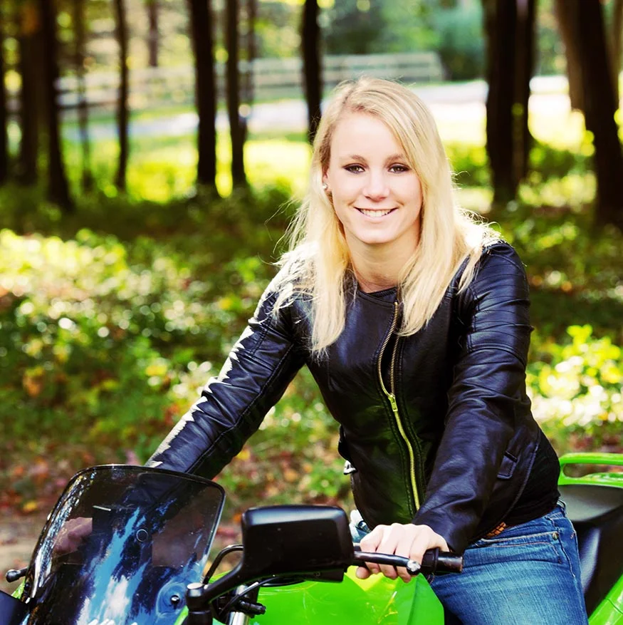 Emily on her motorcycle.jpg