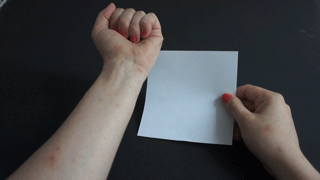 The first instruction is displayed on their wrist. 
