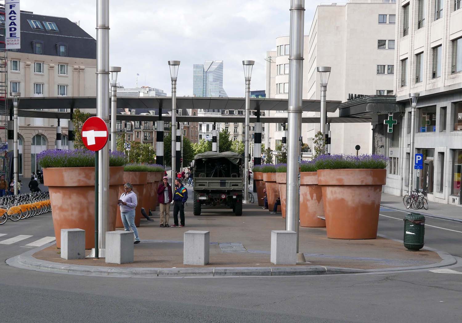giant flower pots with army truck
