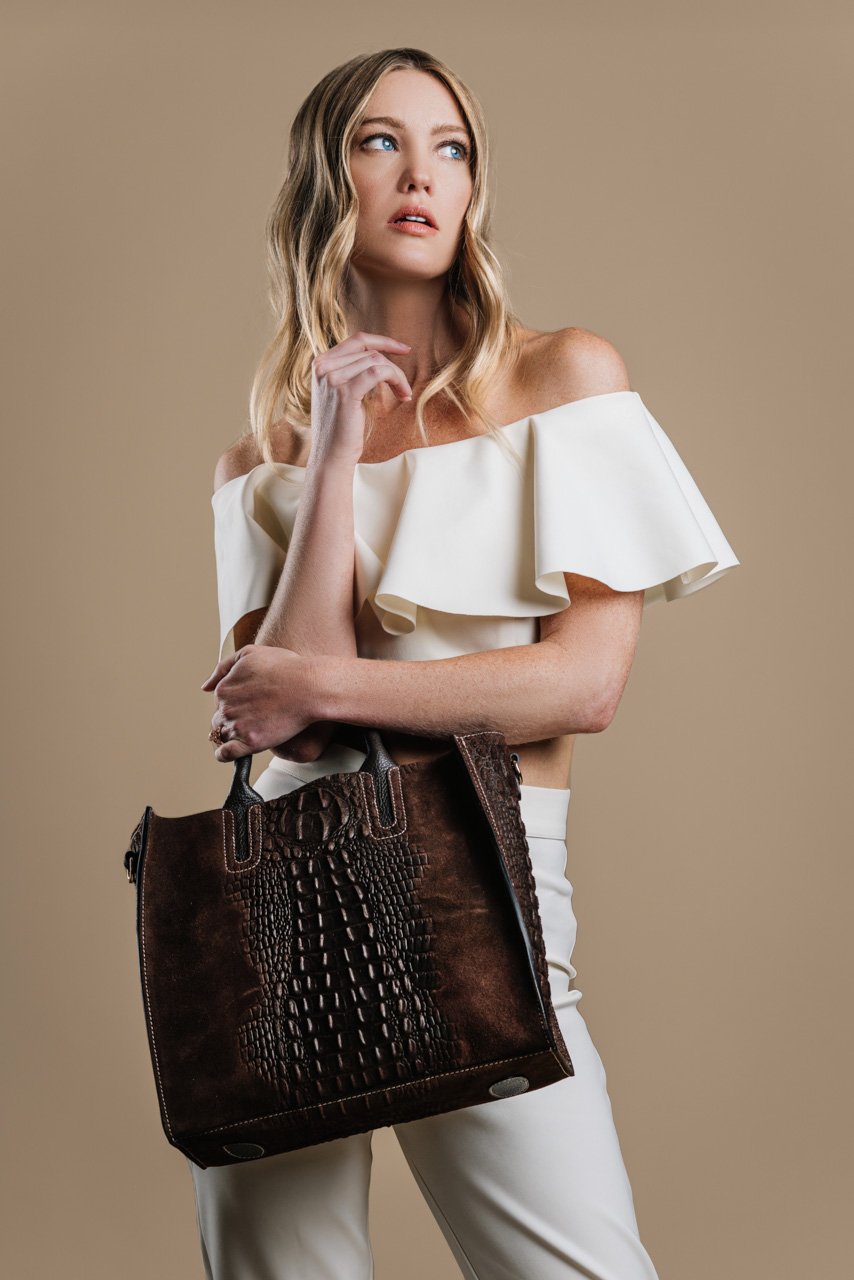 Model with Moda Endrizzi Crocodile print tote bag