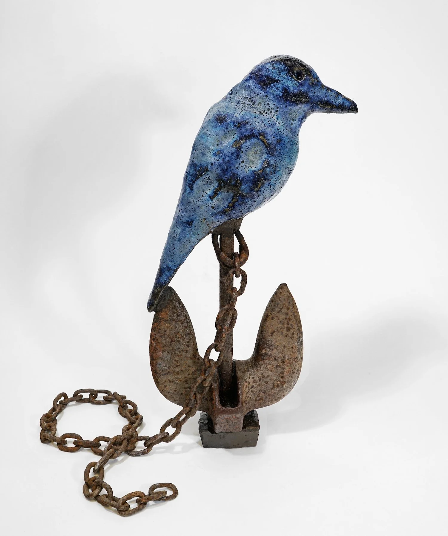 Anchor Crow, 2024. Clay, glaze, found anchor. Approx. 24" high