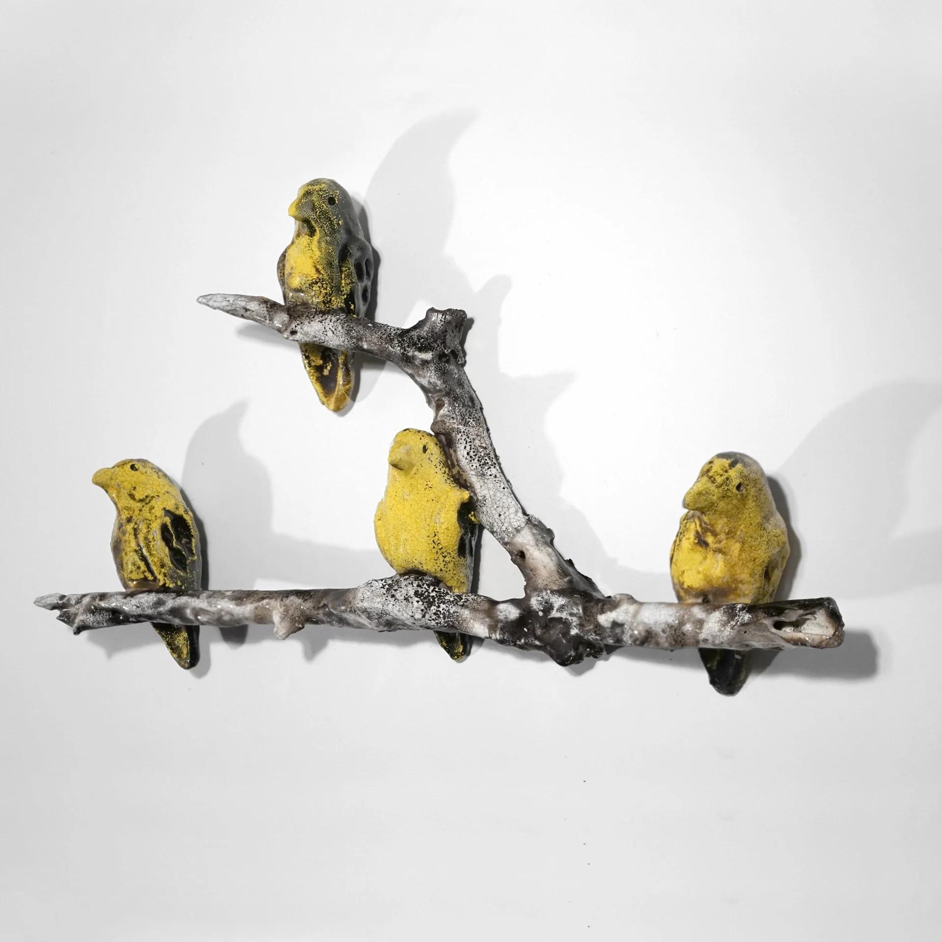 Finches, 2018. Clay, glaze, underglaze. Approx. 8" h x 15" w