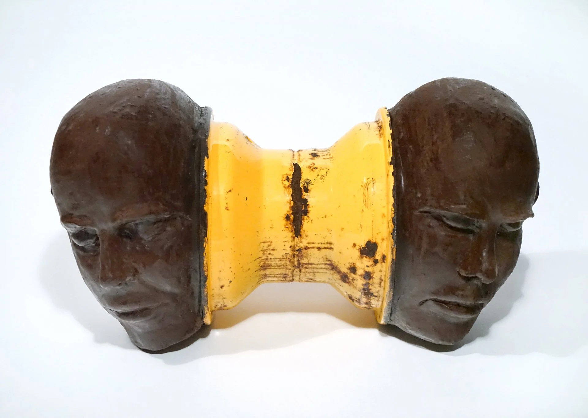 Channel, 2017. Clay, underglaze, found wheel part. Approx. 12" high x 17" w