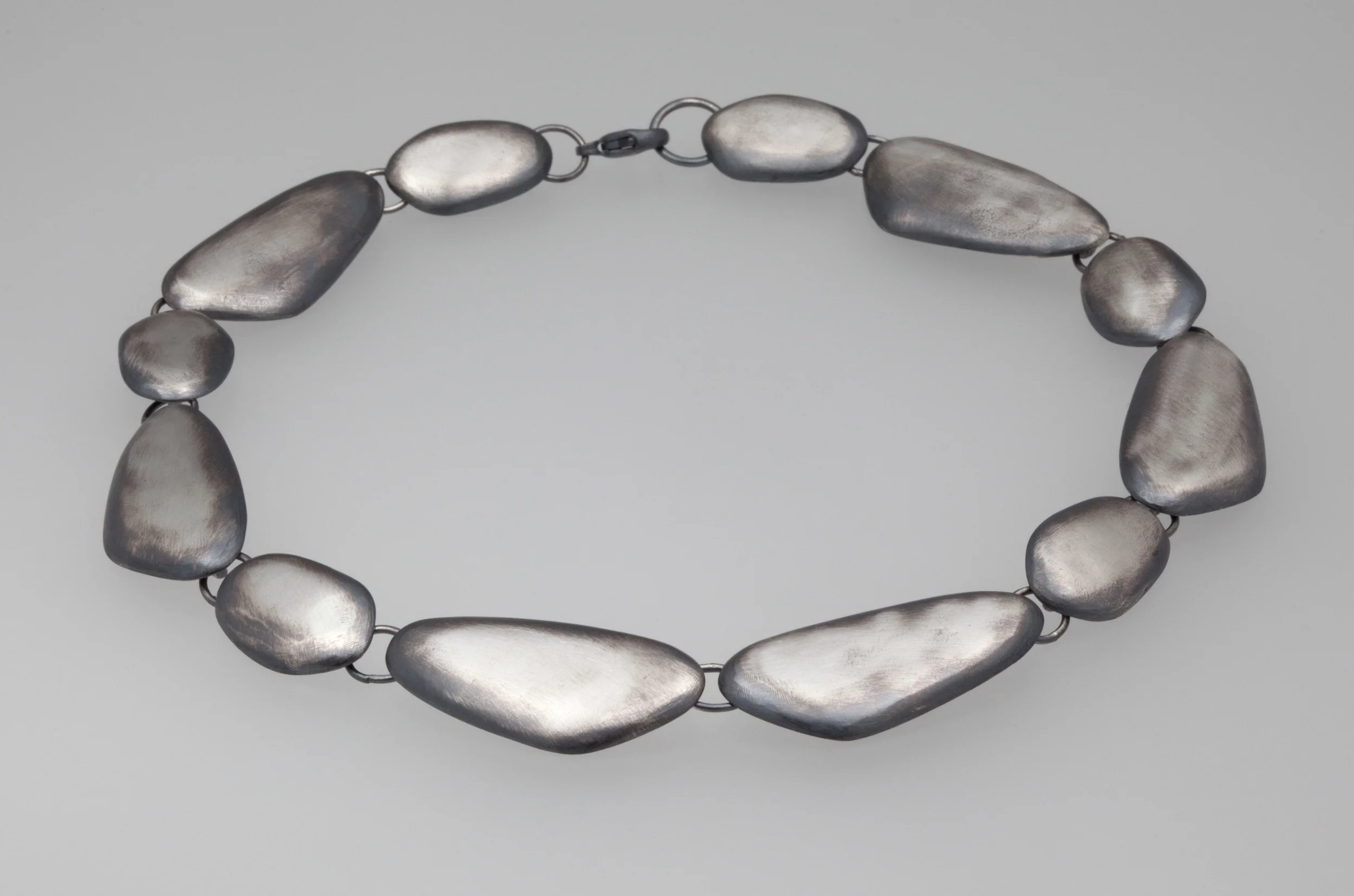 silver-stone-necklace-ox.jpg